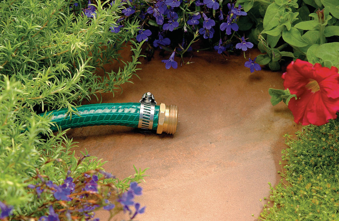 3/4 Inch Male Brass Shane Mender - Displaying hose after repair in garden.