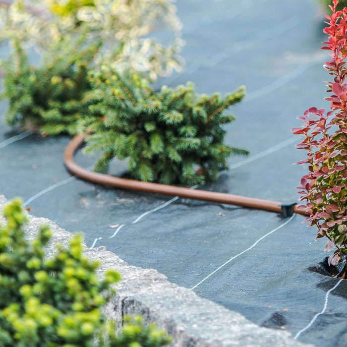 What is the downside of using a drip irrigation system