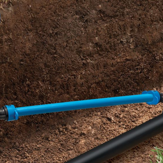 Sprinkler on Blu-lock pipe in trench