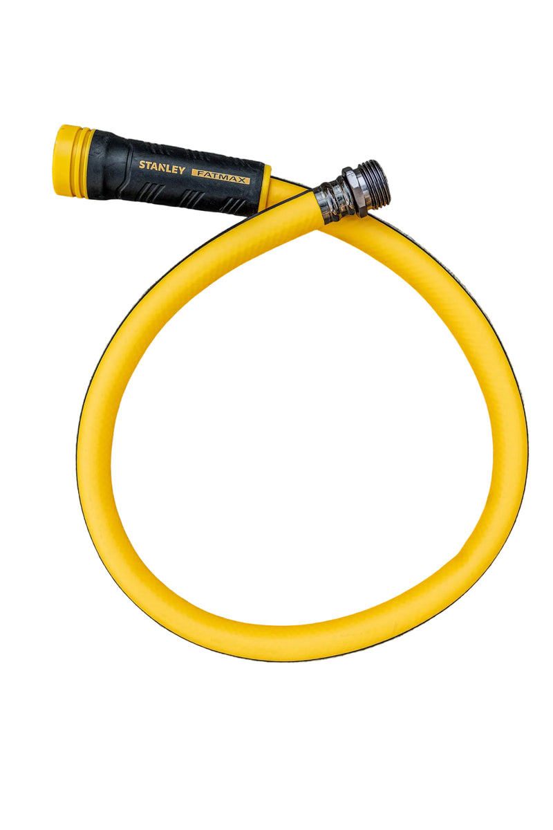 A yellow and black Stanley FATMAX garden hose laid on white