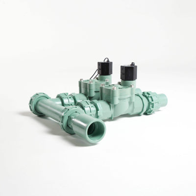 57250 - The preassembled valve manifold can connect to both ¾-inch and 1-inch PVC pipes. 