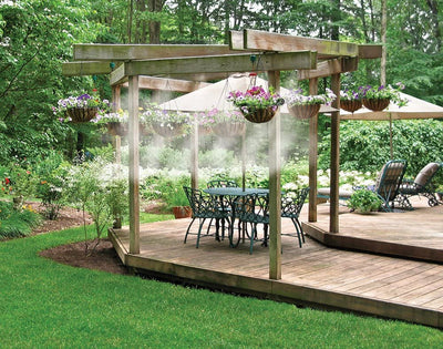 Performance 12 Ft. PVC Mist Cooling System in use on outdoor patio