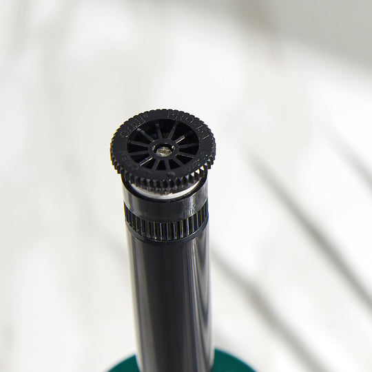 Close up of an adjustable 15-foot nozzle. 