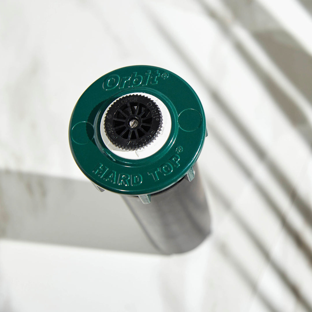 Close up of a professional hard top pop-up sprinkler head. 