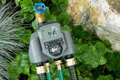 In minutes, the Orbit Integrated 4-Zone Watering System will turn your hose faucet into a programmable sprinkler system. With a large digital display and simple controls, programming the 4-zone timer is fast and easy. Built with high-quality materials and water-resistant construction, you can count on many years of durability and water-saving efficiency. Model number 56545.