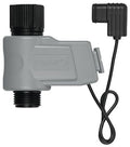 An automatic yard watering kit valve with a gray body and black connectors, featuring a wiring harness.