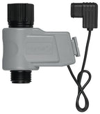 An automatic yard watering kit valve with a gray body and black connectors, featuring a wiring harness.