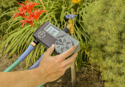 3-Outlet Hose Watering Timer demonstrating manual programming.