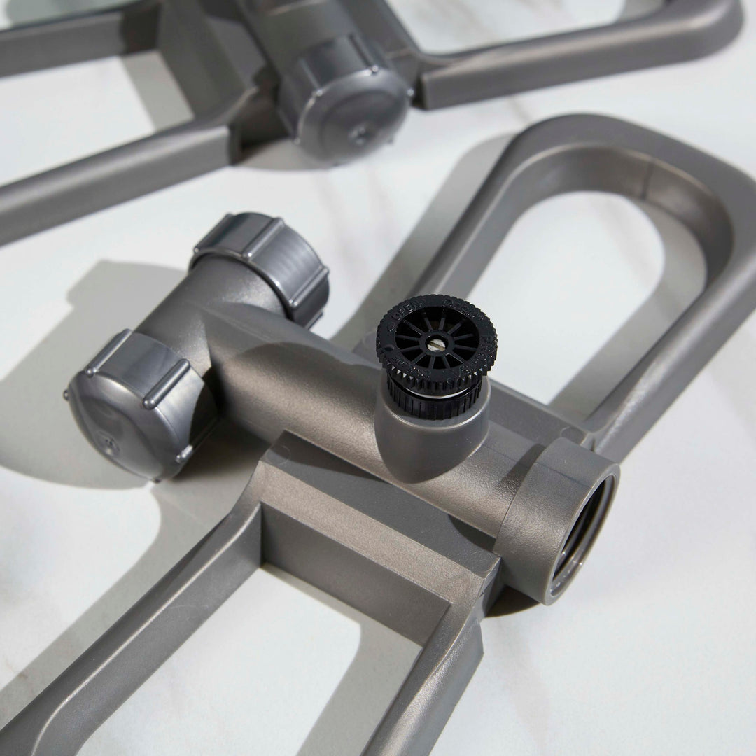 Three Port-A-Rain sprinkler heads with adjustable nozzles. The nozzles are completely adjustable from 0-360Â°