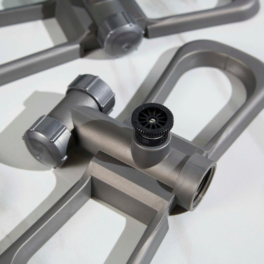 Three Port-A-Rain sprinkler heads with adjustable nozzles. The nozzles are completely adjustable from 0-360Â°